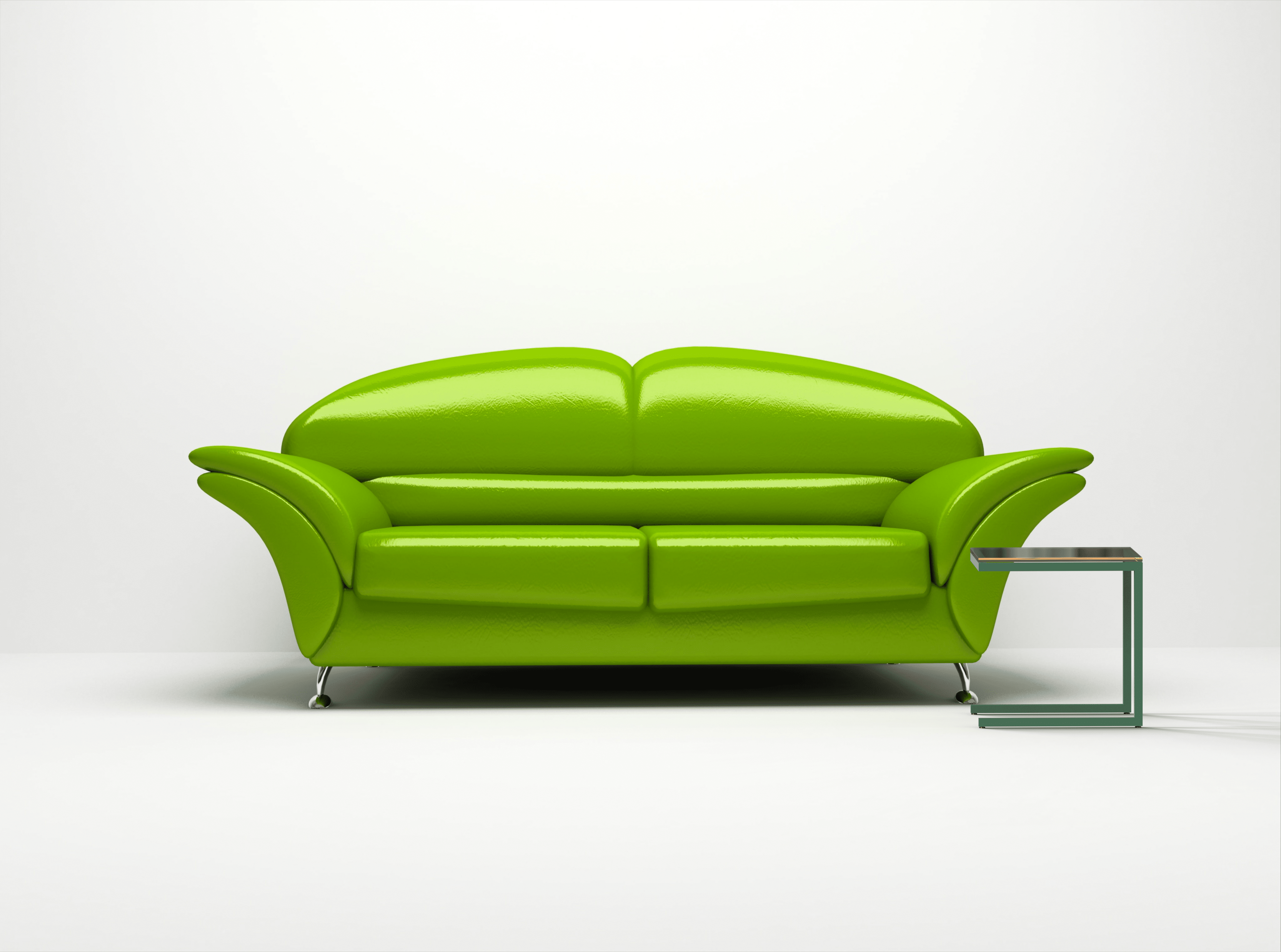 Canapé vert moderne sur fond blanc minimaliste.